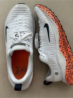 Nike White Shoe with Orange Insole and Black Logo